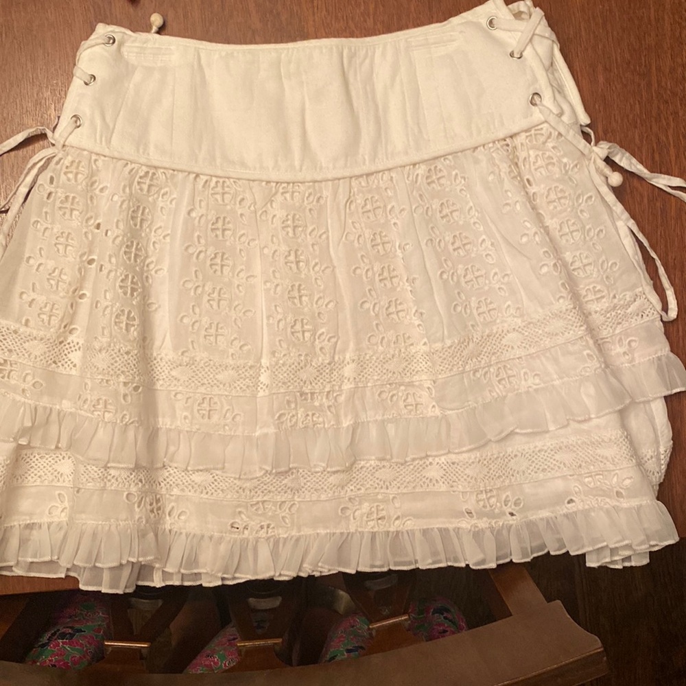 White skirt cross cross ties on both sides